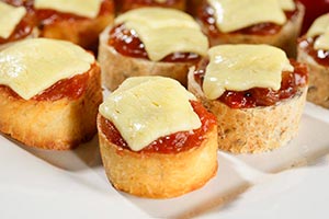 Tomato, Ginger & Chilli Bruschetta topped with Cheddar Cheese